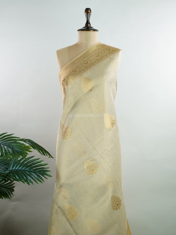 tissue This Kora Semi Tissue saree in rich gold features elegant stripes woven with fine zari. Lightweight and luminous, it captures the essence of festive finesse. Crafted in Varanasi, it drapes with ease and radiance. A timeless choice for celebrations with subtle grandeur. #KoraSemiTissue #GoldStripes #FineZari #VaranasiWeaves #ManoranjithamSarees Supriya - Gold Semi Silk Saree - Manoranjitham Weaves - Handloom Store