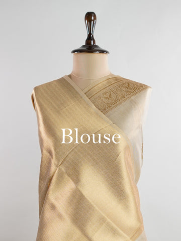 tissue This Kora Semi Tissue saree in rich gold features elegant stripes woven with fine zari. Lightweight and luminous, it captures the essence of festive finesse. Crafted in Varanasi, it drapes with ease and radiance. A timeless choice for celebrations with subtle grandeur. #KoraSemiTissue #GoldStripes #FineZari #VaranasiWeaves #ManoranjithamSarees Supriya - Gold Semi Silk Saree - Manoranjitham Weaves - Handloom Store