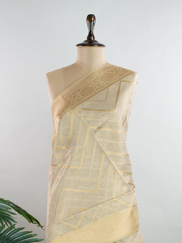 tissue This Kora Semi Tissue saree in rich gold features elegant stripes woven with fine zari. Lightweight and luminous, it captures the essence of festive finesse. Crafted in Varanasi, it drapes with ease and radiance. A timeless choice for celebrations with subtle grandeur. #KoraSemiTissue #GoldStripes #FineZari #VaranasiWeaves #ManoranjithamSarees Nirmala - Gold Semi Silk Saree - Manoranjitham Weaves - Handloom Store