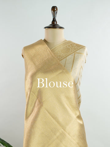 tissue This Kora Semi Tissue saree in rich gold features elegant stripes woven with fine zari. Lightweight and luminous, it captures the essence of festive finesse. Crafted in Varanasi, it drapes with ease and radiance. A timeless choice for celebrations with subtle grandeur. #KoraSemiTissue #GoldStripes #FineZari #VaranasiWeaves #ManoranjithamSarees Nirmala - Gold Semi Silk Saree - Manoranjitham Weaves - Handloom Store