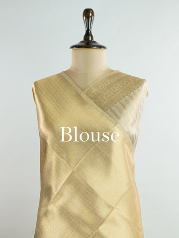 tissue This Kora Semi Tissue saree in rich gold features elegant stripes woven with fine zari. Lightweight and luminous, it captures the essence of festive finesse. Crafted in Varanasi, it drapes with ease and radiance. A timeless choice for celebrations with subtle grandeur. #KoraSemiTissue #GoldStripes #FineZari #VaranasiWeaves #ManoranjithamSarees Gautami - Manoranjitham Weaves - Handloom Store