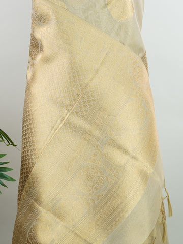 tissue This Kora Semi Tissue saree in rich gold features elegant stripes woven with fine zari. Lightweight and luminous, it captures the essence of festive finesse. Crafted in Varanasi, it drapes with ease and radiance. A timeless choice for celebrations with subtle grandeur. #KoraSemiTissue #GoldStripes #FineZari #VaranasiWeaves #ManoranjithamSarees Srividya - Manoranjitham Weaves - Handloom Store