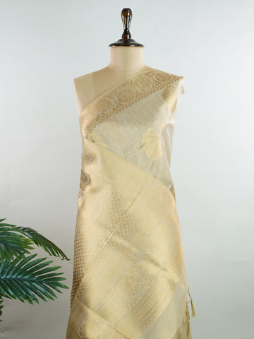 tissue This Kora Semi Tissue saree in rich gold features elegant stripes woven with fine zari. Lightweight and luminous, it captures the essence of festive finesse. Crafted in Varanasi, it drapes with ease and radiance. A timeless choice for celebrations with subtle grandeur. #KoraSemiTissue #GoldStripes #FineZari #VaranasiWeaves #ManoranjithamSarees Srividya - Manoranjitham Weaves - Handloom Store