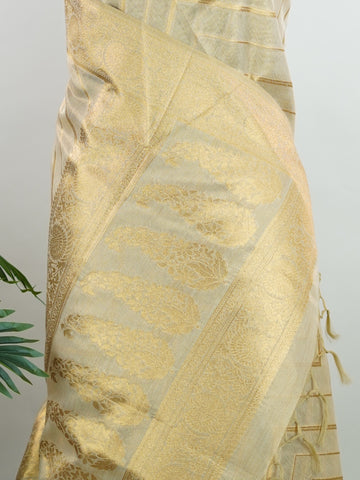 tissue This Kora Semi Tissue saree in rich gold features elegant stripes woven with fine zari. Lightweight and luminous, it captures the essence of festive finesse. Crafted in Varanasi, it drapes with ease and radiance. A timeless choice for celebrations with subtle grandeur. #KoraSemiTissue #GoldStripes #FineZari #VaranasiWeaves #ManoranjithamSarees Vasanti - Gold Semi Silk Saree - Manoranjitham Weaves - Handloom Store