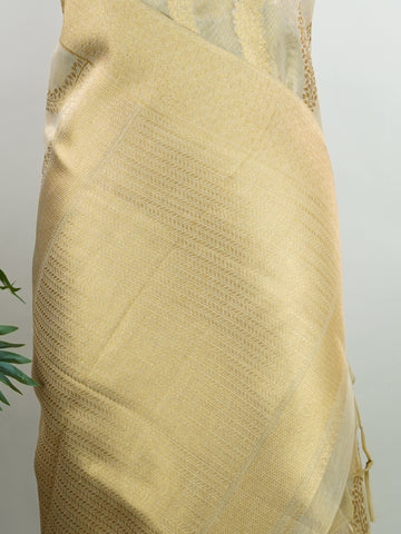 tissue This Kora Semi Tissue saree in rich gold features elegant stripes woven with fine zari. Lightweight and luminous, it captures the essence of festive finesse. Crafted in Varanasi, it drapes with ease and radiance. A timeless choice for celebrations with subtle grandeur. #KoraSemiTissue #GoldStripes #FineZari #VaranasiWeaves #ManoranjithamSarees Yashoda - Gold Semi Silk Saree - Manoranjitham Weaves - Handloom Store
