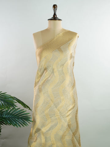 tissue This Kora Semi Tissue saree in rich gold features elegant stripes woven with fine zari. Lightweight and luminous, it captures the essence of festive finesse. Crafted in Varanasi, it drapes with ease and radiance. A timeless choice for celebrations with subtle grandeur. #KoraSemiTissue #GoldStripes #FineZari #VaranasiWeaves #ManoranjithamSarees Yashoda - Gold Semi Silk Saree - Manoranjitham Weaves - Handloom Store