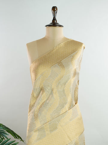 tissue This Kora Semi Tissue saree in rich gold features elegant stripes woven with fine zari. Lightweight and luminous, it captures the essence of festive finesse. Crafted in Varanasi, it drapes with ease and radiance. A timeless choice for celebrations with subtle grandeur. #KoraSemiTissue #GoldStripes #FineZari #VaranasiWeaves #ManoranjithamSarees Yashoda - Gold Semi Silk Saree - Manoranjitham Weaves - Handloom Store