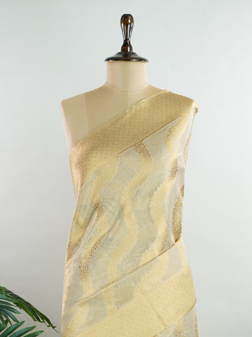 tissue This Kora Semi Tissue saree in rich gold features elegant stripes woven with fine zari. Lightweight and luminous, it captures the essence of festive finesse. Crafted in Varanasi, it drapes with ease and radiance. A timeless choice for celebrations with subtle grandeur. #KoraSemiTissue #GoldStripes #FineZari #VaranasiWeaves #ManoranjithamSarees Jeevitha - Manoranjitham Weaves - Handloom Store