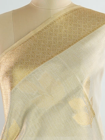 tissue This Kora Semi Tissue saree in rich gold features elegant stripes woven with fine zari. Lightweight and luminous, it captures the essence of festive finesse. Crafted in Varanasi, it drapes with ease and radiance. A timeless choice for celebrations with subtle grandeur. #KoraSemiTissue #GoldStripes #FineZari #VaranasiWeaves #ManoranjithamSarees Rajeswari - Gold Semi Silk Saree - Manoranjitham Weaves - Handloom Store