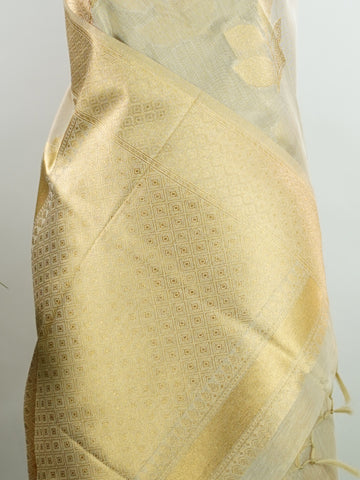 tissue This Kora Semi Tissue saree in rich gold features elegant stripes woven with fine zari. Lightweight and luminous, it captures the essence of festive finesse. Crafted in Varanasi, it drapes with ease and radiance. A timeless choice for celebrations with subtle grandeur. #KoraSemiTissue #GoldStripes #FineZari #VaranasiWeaves #ManoranjithamSarees Rajeswari - Gold Semi Silk Saree - Manoranjitham Weaves - Handloom Store