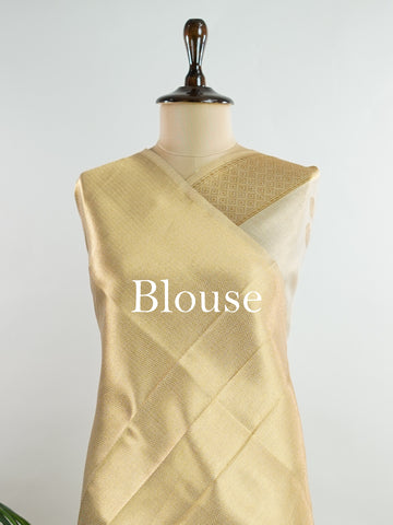 tissue This Kora Semi Tissue saree in rich gold features elegant stripes woven with fine zari. Lightweight and luminous, it captures the essence of festive finesse. Crafted in Varanasi, it drapes with ease and radiance. A timeless choice for celebrations with subtle grandeur. #KoraSemiTissue #GoldStripes #FineZari #VaranasiWeaves #ManoranjithamSarees Rajeswari - Gold Semi Silk Saree - Manoranjitham Weaves - Handloom Store