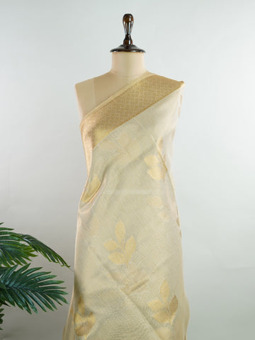 tissue This Kora Semi Tissue saree in rich gold features elegant stripes woven with fine zari. Lightweight and luminous, it captures the essence of festive finesse. Crafted in Varanasi, it drapes with ease and radiance. A timeless choice for celebrations with subtle grandeur. #KoraSemiTissue #GoldStripes #FineZari #VaranasiWeaves #ManoranjithamSarees Bhuvaneshwari - Gold Semi Silk Saree - Manoranjitham Weaves - Handloom Store