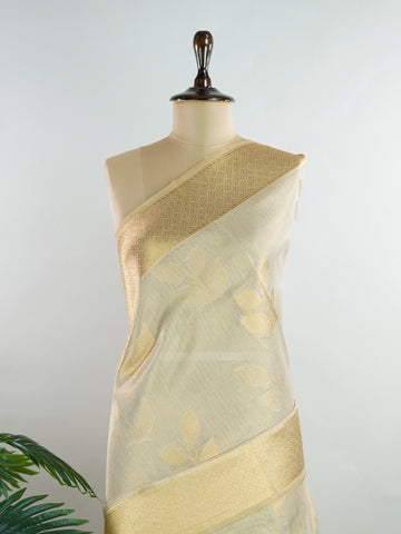 tissue This Kora Semi Tissue saree in rich gold features elegant stripes woven with fine zari. Lightweight and luminous, it captures the essence of festive finesse. Crafted in Varanasi, it drapes with ease and radiance. A timeless choice for celebrations with subtle grandeur. #KoraSemiTissue #GoldStripes #FineZari #VaranasiWeaves #ManoranjithamSarees Bhuvaneshwari - Gold Semi Silk Saree - Manoranjitham Weaves - Handloom Store