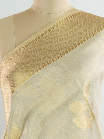 tissue This Kora Semi Tissue saree in rich gold features elegant stripes woven with fine zari. Lightweight and luminous, it captures the essence of festive finesse. Crafted in Varanasi, it drapes with ease and radiance. A timeless choice for celebrations with subtle grandeur. #KoraSemiTissue #GoldStripes #FineZari #VaranasiWeaves #ManoranjithamSarees Bhuvaneshwari - Gold Semi Silk Saree - Manoranjitham Weaves - Handloom Store