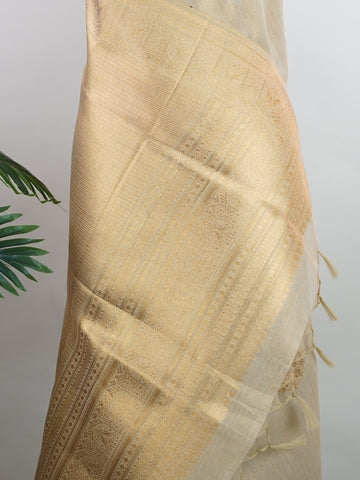 tissue This Kora Semi Tissue saree in rich gold features elegant stripes woven with fine zari. Lightweight and luminous, it captures the essence of festive finesse. Crafted in Varanasi, it drapes with ease and radiance. A timeless choice for celebrations with subtle grandeur. #KoraSemiTissue #GoldStripes #FineZari #VaranasiWeaves #ManoranjithamSarees Sharvani - Gold Semi Silk Saree - Manoranjitham Weaves - Handloom Store