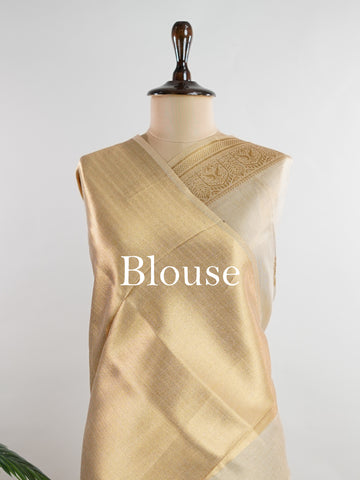tissue This Kora Semi Tissue saree in rich gold features elegant stripes woven with fine zari. Lightweight and luminous, it captures the essence of festive finesse. Crafted in Varanasi, it drapes with ease and radiance. A timeless choice for celebrations with subtle grandeur. #KoraSemiTissue #GoldStripes #FineZari #VaranasiWeaves #ManoranjithamSarees Sharvani - Gold Semi Silk Saree - Manoranjitham Weaves - Handloom Store