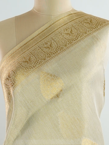 tissue This Kora Semi Tissue saree in rich gold features elegant stripes woven with fine zari. Lightweight and luminous, it captures the essence of festive finesse. Crafted in Varanasi, it drapes with ease and radiance. A timeless choice for celebrations with subtle grandeur. #KoraSemiTissue #GoldStripes #FineZari #VaranasiWeaves #ManoranjithamSarees Sharvani - Gold Semi Silk Saree - Manoranjitham Weaves - Handloom Store