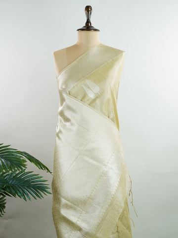 tissue Drenched in gold, this Semi Tissue saree shimmers with floral weave detailing and fine zari. Its lightweight texture and luminous finish make it a festive favourite. Crafted in Varanasi, it carries elegance in every thread. Ideal for weddings, receptions, and moments that deserve radiance. #SemiTissue #GoldenGlow #FloralWeave #FineZari #ManoranjithamSarees Pranathi - Semi Silk Saree - Manoranjitham Weaves - Handloom Store