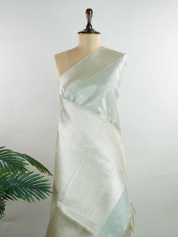 tissue Drenched in gold, this Semi Tissue saree shimmers with floral weave detailing and fine zari. Its lightweight texture and luminous finish make it a festive favourite. Crafted in Varanasi, it carries elegance in every thread. Ideal for weddings, receptions, and moments that deserve radiance. #SemiTissue #GoldenGlow #FloralWeave #FineZari #ManoranjithamSarees Sankara - Semi Silk Saree - Manoranjitham Weaves - Handloom Store