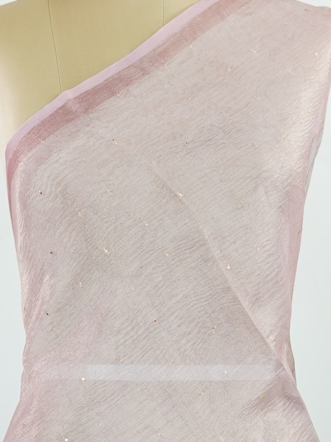 tissue A delicate Banaras Tissue saree woven in the heritage looms of Varanasi, this piece captures the timeless shimmer of fine zari work on a lightweight, translucent base. The luminous fabric drapes effortlessly and catches the light beautifully, making it an ideal choice for festive gatherings, pujas, and celebrations. Its airy texture keeps you comfortable while the subtle zari detailing adds a touch of understated elegance. tissue - Semi Silk Saree - Manoranjitham Weaves - Handloom Store