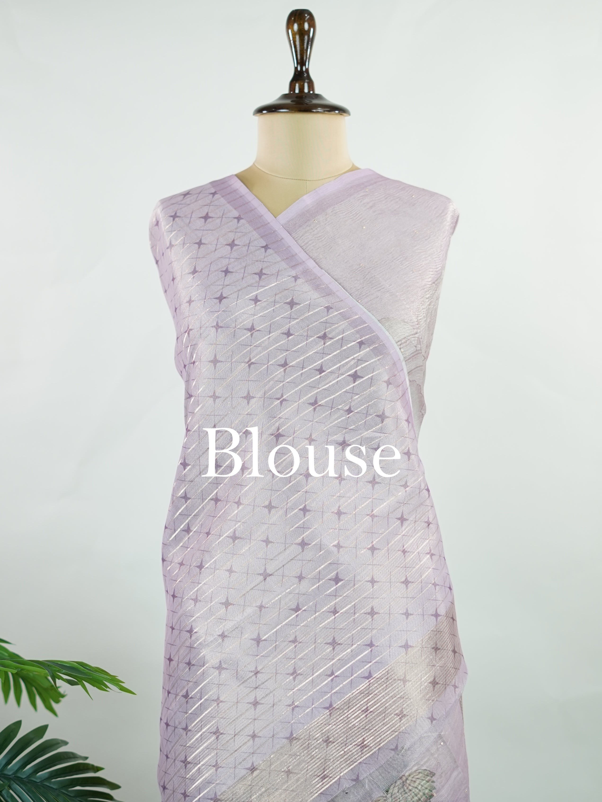 tissue A delicate Banaras Tissue saree woven in the heritage looms of Varanasi, this piece captures the timeless shimmer of fine zari work on a lightweight, translucent base. The luminous fabric drapes effortlessly and catches the light beautifully, making it an ideal choice for festive gatherings, pujas, and celebrations. Its airy texture keeps you comfortable while the subtle zari detailing adds a touch of understated elegance. tissue - Semi Silk Saree - Manoranjitham Weaves - Handloom Store