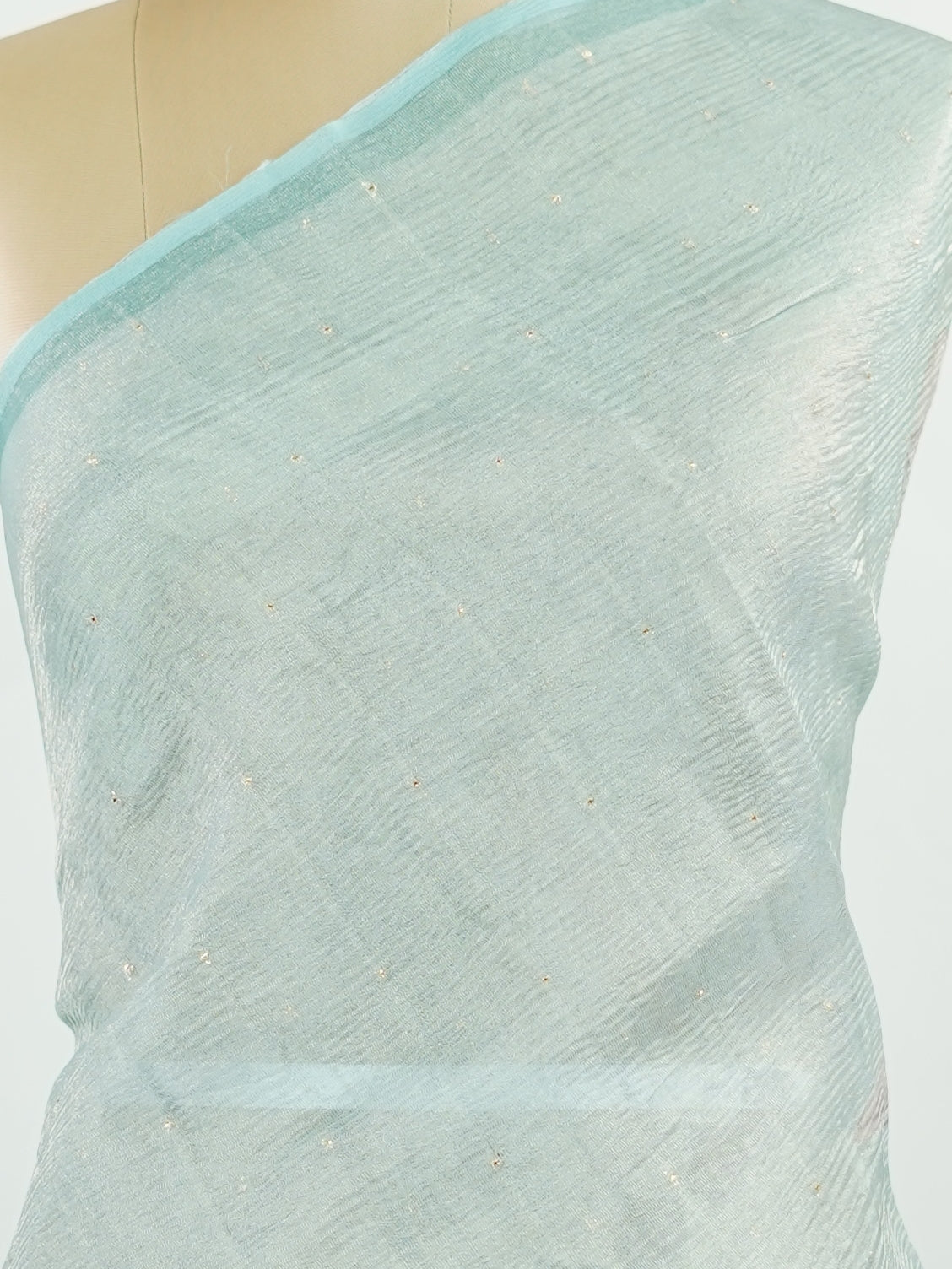 tissue A delicate Banaras Tissue saree woven in the heritage looms of Varanasi, this piece captures the timeless shimmer of fine zari work on a lightweight, translucent base. The luminous fabric drapes effortlessly and catches the light beautifully, making it an ideal choice for festive gatherings, pujas, and celebrations. Its airy texture keeps you comfortable while the subtle zari detailing adds a touch of understated elegance. tissue - Semi Silk Saree - Manoranjitham Weaves - Handloom Store