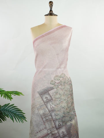 tissue A delicate Banaras Tissue saree woven in the heritage looms of Varanasi, this piece captures the timeless shimmer of fine zari work on a lightweight, translucent base. The luminous fabric drapes effortlessly and catches the light beautifully, making it an ideal choice for festive gatherings, pujas, and celebrations. Its airy texture keeps you comfortable while the subtle zari detailing adds a touch of understated elegance. tissue - Semi Silk Saree - Manoranjitham Weaves - Handloom Store