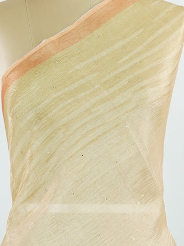 tissue This lightweight Semi Tissue saree from Varanasi blends the translucent beauty of tissue fabric with fine zari weave patterns that shimmer delicately across its surface. Its smooth drape and luminous finish make it a versatile choice for festive occasions, evening outings, and celebrations. A beautiful balance of traditional craftsmanship and contemporary wearability. Semi Tissue - Semi Silk Saree - Manoranjitham Weaves - Handloom Store