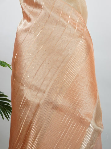 tissue This lightweight Semi Tissue saree from Varanasi blends the translucent beauty of tissue fabric with fine zari weave patterns that shimmer delicately across its surface. Its smooth drape and luminous finish make it a versatile choice for festive occasions, evening outings, and celebrations. A beautiful balance of traditional craftsmanship and contemporary wearability. Semi Tissue - Semi Silk Saree - Manoranjitham Weaves - Handloom Store