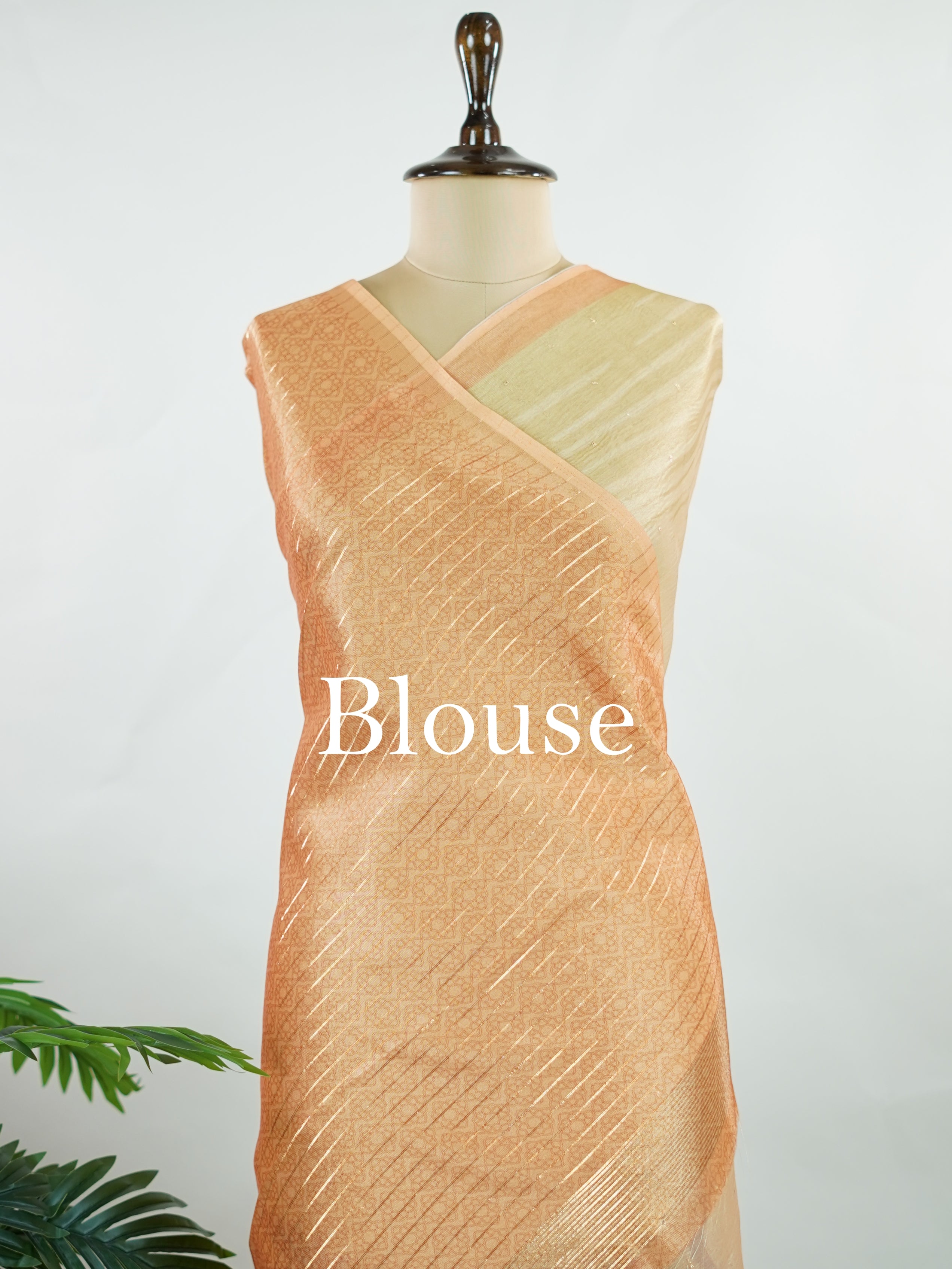 tissue This lightweight Semi Tissue saree from Varanasi blends the translucent beauty of tissue fabric with fine zari weave patterns that shimmer delicately across its surface. Its smooth drape and luminous finish make it a versatile choice for festive occasions, evening outings, and celebrations. A beautiful balance of traditional craftsmanship and contemporary wearability. Semi Tissue - Semi Silk Saree - Manoranjitham Weaves - Handloom Store