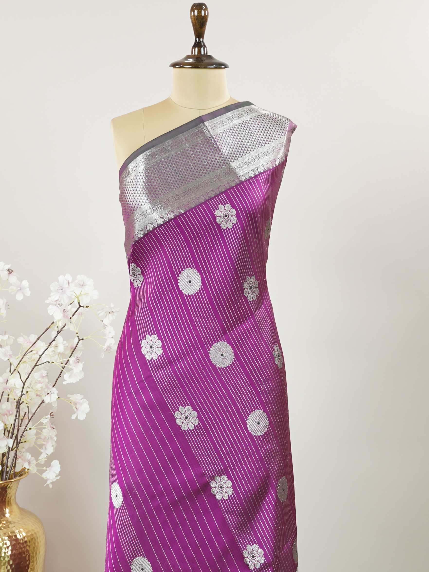 Venkatagiri Silk Woven in the heart of Andhra Pradesh, this Venkatagiri handloom saree is a symbol of regal elegance and heritage. Known for its soft texture and intricate craftsmanship, it drapes gracefully for weddings, pujas, and festive moments. Each thread carries tradition, making it a cherished piece of South Indian artistry. Lightweight yet luxurious — a true sree in every sense. Dharmavati - Venkatagiri Pure Silk Saree - Manoranjitham Weaves - Handloom Store