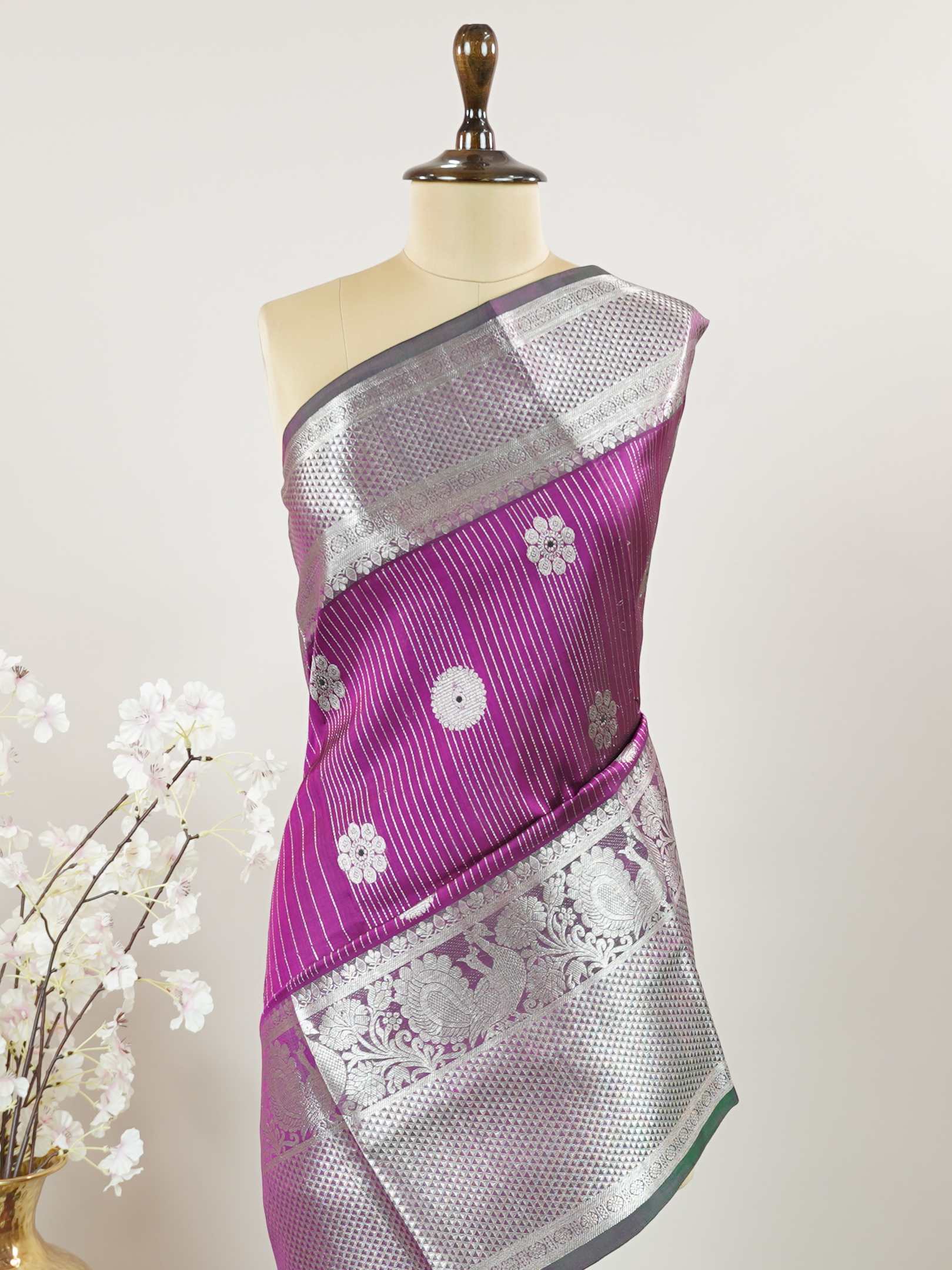 Venkatagiri Silk Woven in the heart of Andhra Pradesh, this Venkatagiri handloom saree is a symbol of regal elegance and heritage. Known for its soft texture and intricate craftsmanship, it drapes gracefully for weddings, pujas, and festive moments. Each thread carries tradition, making it a cherished piece of South Indian artistry. Lightweight yet luxurious — a true sree in every sense. Dharmavati - Venkatagiri Pure Silk Saree - Manoranjitham Weaves - Handloom Store