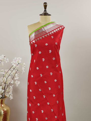 Venkatagiri Silk This 100% Pure Silk  silk saree, adorned in Red and detailed with Pure Zari weaving, reflects the grandeur of Venkatagiri. The timeless Buttis motifs enhance its bridal charm. A perfect blend of luxury and tradition, it is designed for those who appreciate fine craftsmanship. Patdeepa - Red Venkatagiri Pure Silk Saree - Manoranjitham Weaves - Handloom Store
