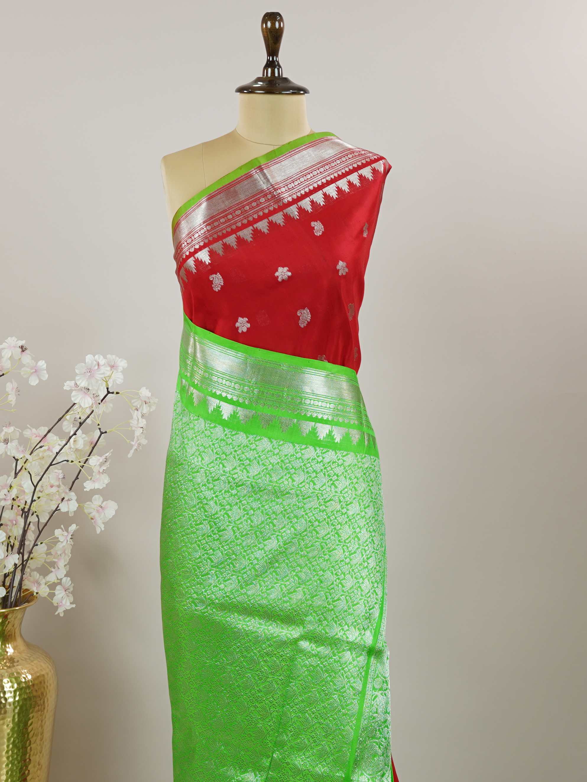 Venkatagiri Silk This 100% Pure Silk  silk saree, adorned in Red and detailed with Pure Zari weaving, reflects the grandeur of Venkatagiri. The timeless Buttis motifs enhance its bridal charm. A perfect blend of luxury and tradition, it is designed for those who appreciate fine craftsmanship. Patdeepa - Red Venkatagiri Pure Silk Saree - Manoranjitham Weaves - Handloom Store