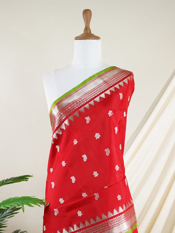 Venkatagiri Silk This 100% Pure Silk  silk saree, adorned in Red and detailed with Pure Zari weaving, reflects the grandeur of Venkatagiri. The timeless Buttis motifs enhance its bridal charm. A perfect blend of luxury and tradition, it is designed for those who appreciate fine craftsmanship. Patdeepa     - Manoranjitham Weaves - Handloom Store