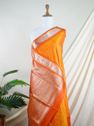 Venkatagiri Silk This 100% Pure Silk  silk saree, adorned in Coral and detailed with Pure Zari weaving, reflects the grandeur of Venkatagiri. The timeless Buttis motifs enhance its bridal charm. A perfect blend of luxury and tradition, it is designed for those who appreciate fine craftsmanship. Gaud Sarang - Manoranjitham Weaves - Handloom Store