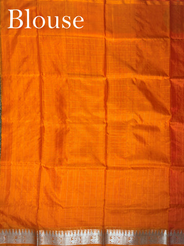 Venkatagiri Silk This 100% Pure Silk  silk saree, adorned in Coral and detailed with Pure Zari weaving, reflects the grandeur of Venkatagiri. The timeless Buttis motifs enhance its bridal charm. A perfect blend of luxury and tradition, it is designed for those who appreciate fine craftsmanship. Gaud Sarang - Manoranjitham Weaves - Handloom Store