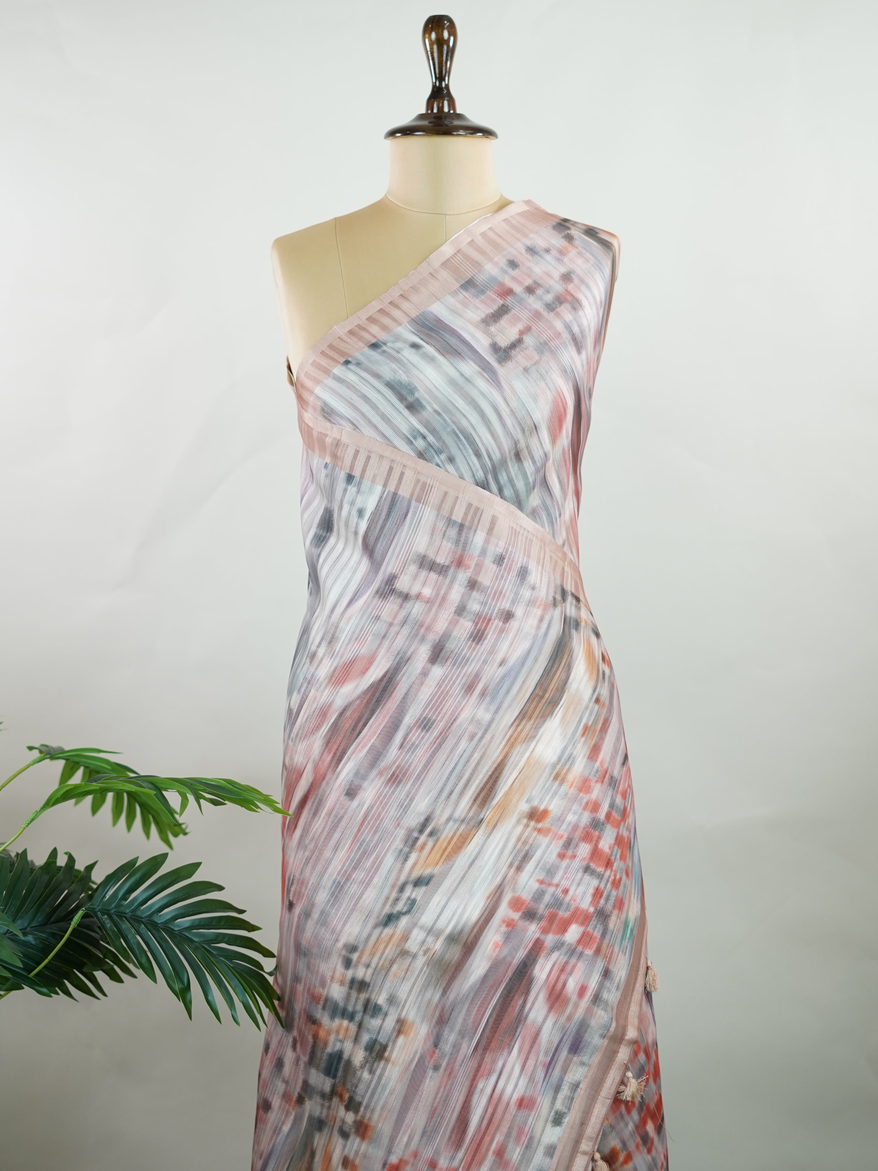 Kora This Kora saree from Varanasi features a contemporary digital print on a sheer, lightweight base. The airy texture of Kora silk meets modern artistry, creating a drape that's elegant, easy to wear, and full of visual charm—perfect for casual gatherings or stylish day events.br
#KoraSilk #DigitalPrintSaree #VaranasiWeaves #SheerElegance #ModernTradition #Manoranjitham #ManoranjithamStyle Anuradha - Handloom Pure Silk Saree | Digital Print - Manoranjitham Weaves - Handloom Store
