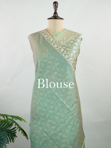 Cotton A graceful Cotton Silk saree that beautifully blends comfort with elegance. Woven with a smooth, soft texture, it drapes effortlessly and keeps you at ease through long hours of wear. The fabric's natural breathability makes it a go-to for both daily wear and light festive occasions. Simple yet refined, this saree is a testament to the enduring appeal of handcrafted Indian cotton weaves. Sharvitha - Handloom Cotton Saree | Zari Border | Traditional - Manoranjitham Weaves - Handloom Store