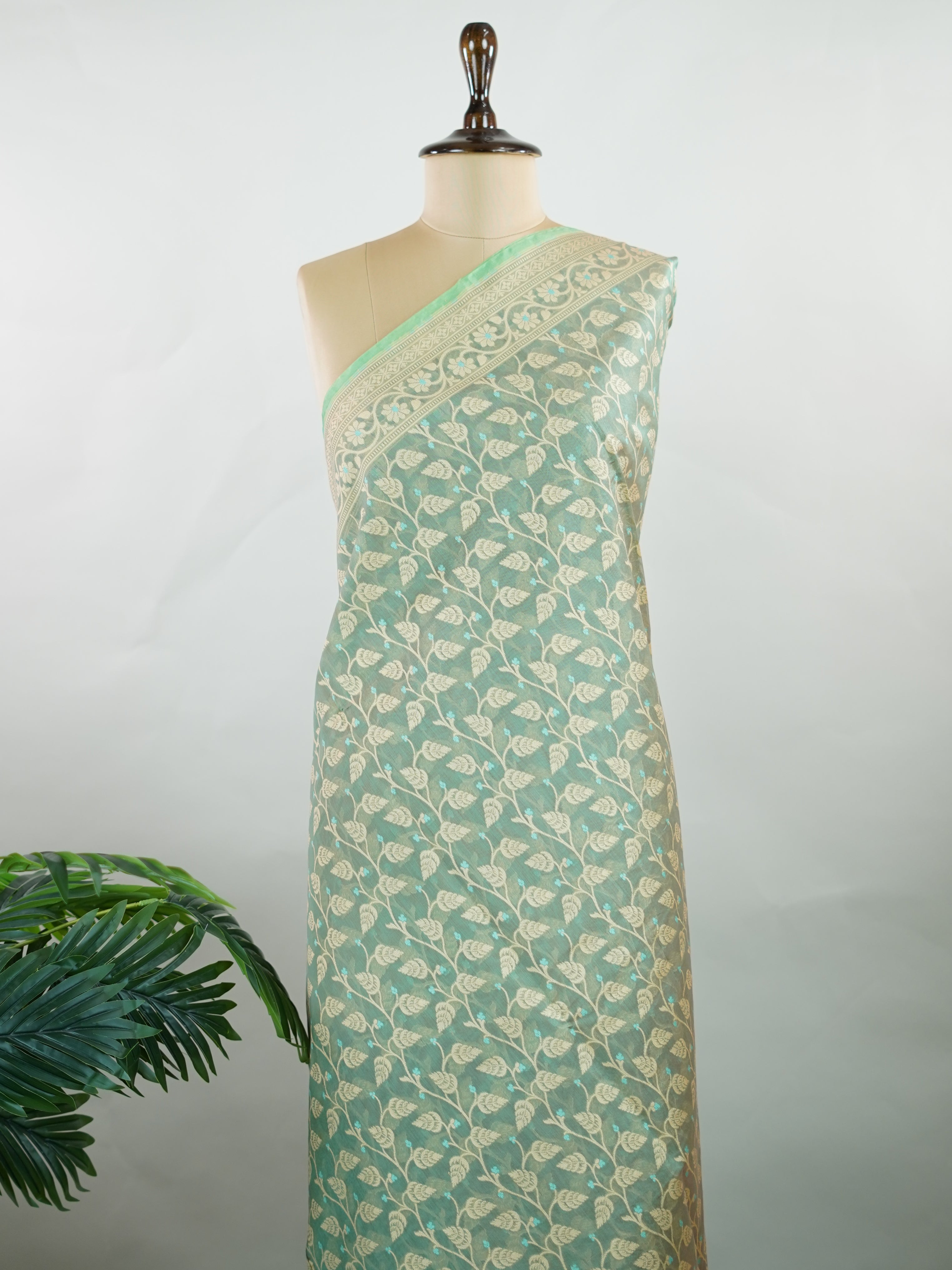Cotton A graceful Cotton Silk saree that beautifully blends comfort with elegance. Woven with a smooth, soft texture, it drapes effortlessly and keeps you at ease through long hours of wear. The fabric's natural breathability makes it a go-to for both daily wear and light festive occasions. Simple yet refined, this saree is a testament to the enduring appeal of handcrafted Indian cotton weaves. Sharvitha - Handloom Cotton Saree | Zari Border | Traditional - Manoranjitham Weaves - Handloom Store
