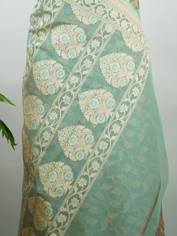 Cotton A graceful Cotton Silk saree that beautifully blends comfort with elegance. Woven with a smooth, soft texture, it drapes effortlessly and keeps you at ease through long hours of wear. The fabric's natural breathability makes it a go-to for both daily wear and light festive occasions. Simple yet refined, this saree is a testament to the enduring appeal of handcrafted Indian cotton weaves. Sharvitha - Handloom Cotton Saree | Zari Border | Traditional - Manoranjitham Weaves - Handloom Store
