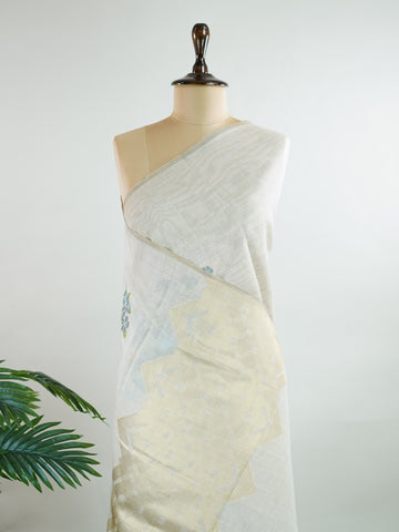 Cotton In soothing grey, this 100% Pure Cotton saree brings quiet beauty to everyday wear.br
Floral motifs bloom gently across the body, adding a soft, natural charm.br
Woven in Varanasi, it offers breathability and comfort all day long.br
A timeless choice for effortless grace.br
#PureCottonSaree #GreyElegance #FloralMotifs #VaranasiWeaves #ManoranjithamSarees Anjali - Handloom Cotton Saree | Zari Border | Traditional - Manoranjitham Weaves - Handloom Store