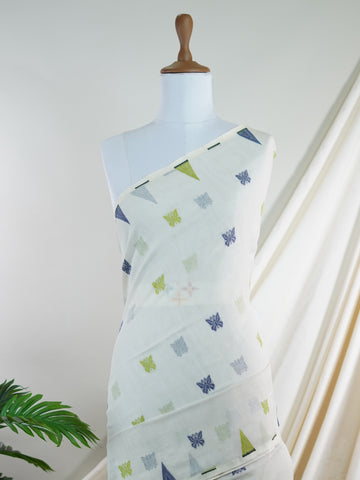 Cotton Woven with care in the looms of West Bengal, this 100% pure cotton saree blends everyday comfort with understated elegance. Fine zari floral designs shimmer softly against the breathable fabric, while the small border adds a touch of refinement. Lightweight and timeless, it’s perfect for summer gatherings and quiet celebrations Vathapi - Handloom Cotton Saree - Manoranjitham Weaves - Handloom Store