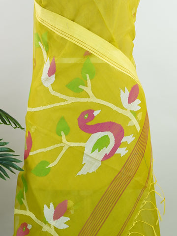 Cotton Woven with care in the looms of West Bengal, this 100% pure cotton saree blends everyday comfort with understated elegance. Fine zari floral designs shimmer softly against the breathable fabric, while the small border adds a touch of refinement. Lightweight and timeless, it’s perfect for summer gatherings and quiet celebrations Todi - Handloom Cotton Saree - Manoranjitham Weaves - Handloom Store