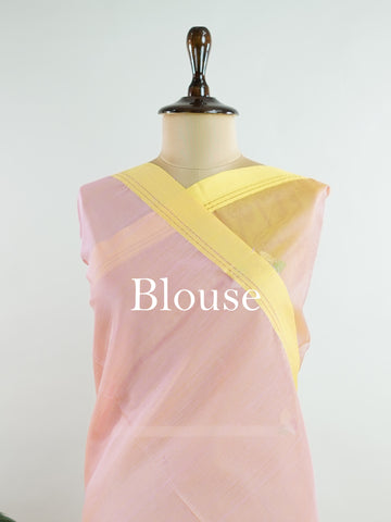 Cotton Woven with care in the looms of West Bengal, this 100% pure cotton saree blends everyday comfort with understated elegance. Fine zari floral designs shimmer softly against the breathable fabric, while the small border adds a touch of refinement. Lightweight and timeless, it’s perfect for summer gatherings and quiet celebrations Vyasa - Handloom Cotton Saree - Manoranjitham Weaves - Handloom Store
