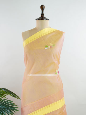 Cotton Woven with care in the looms of West Bengal, this 100% pure cotton saree blends everyday comfort with understated elegance. Fine zari floral designs shimmer softly against the breathable fabric, while the small border adds a touch of refinement. Lightweight and timeless, it’s perfect for summer gatherings and quiet celebrations Vyasa - Handloom Cotton Saree - Manoranjitham Weaves - Handloom Store