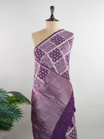 Cotton A deep purple canvas brought to life with traditional gold block prints.br
Lightweight cotton from Varanasi, perfect for all-day grace and comfort.br
A blend of heritage design and subtle radiance for festive or casual charm.br
Handloom beauty in every thread. #CottonElegance #HandloomVaranasi #BlockPrintLove Lalitha - Purple Handloom Cotton Saree | Zari Border | Traditional - Manoranjitham Weaves - Handloom Store