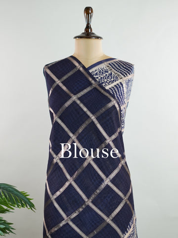 Cotton Classic blue cotton meets the shimmer of gold block prints in a timeless pairing.br
Woven in Varanasi, it carries both comfort and quiet luxury.br
Perfect for work days, gatherings, or a touch of tradition anytime.br
#HandloomCotton #BlockPrintSaree #VaranasiWeaves Parvathi - Blue Handloom Cotton Saree | Zari Border | Traditional - Manoranjitham Weaves - Handloom Store