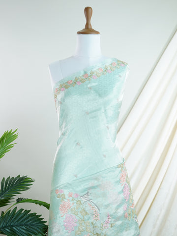 Katan Woven in the storied looms of Varanasi, this tissue saree is a luminous canvas of delicate embroidery. Its gossamer sheen and intricate handwork come together in a drape that feels both weightless and regal. A graceful choice for celebrations that call for quiet opulence. #TissueSaree #EmbroideredElegance #VaranasiHandloom #SheerLuxury #TimelessDrape Rohitha - Manoranjitham Weaves - Handloom Store