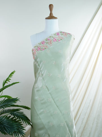 Tissue Woven in Varanasi, this ethereal grey glass tissue saree shimmers with a multi-hued embroidered flourish. Light as air yet rich in detail, it blends sheer elegance with vibrant artistry. A perfect pick for soirées that call for subtle glamour and intricate craftsmanship. #GlassTissueSaree #EmbroideredElegance #VaranasiWeaves #GreyAndGraceful #SheerHeritage






 Saradha - Manoranjitham Weaves - Handloom Store